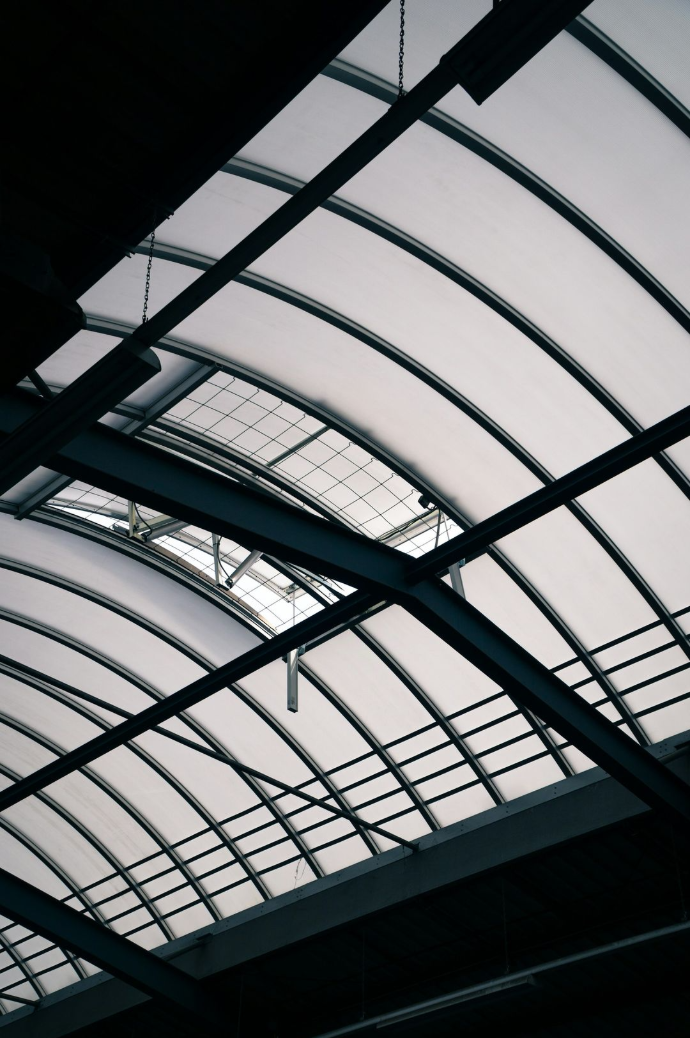 a view of the ceiling of a train station